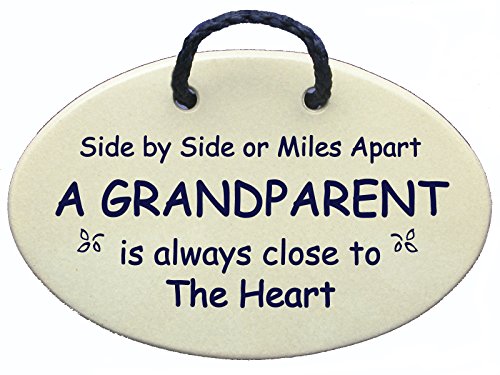 Product Cover Side by side or miles apart A GRANDPARENT is always close to the heart. Ceramic plaque handmade in the USA for over 30 years. Reduced price for this New Saying.