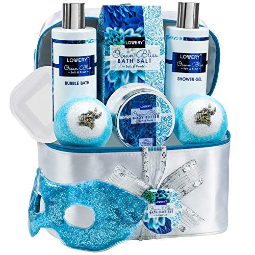 Product Cover Home Spa Gift Baskets For Women - Bath and Body Gift Bag - Ocean Bliss Spa Set with Glittery Reusable Hot and Cold Eye Mask, Body Lotion, 2 Ex-Large Bath Bombs - 6oz Silver Travel Cosmetics Bag & More