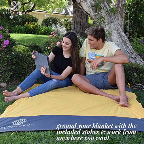 Product Cover ECCOSOPHY Sand Proof Beach Blanket - 100% Waterproof Picnic Blanket 65x55 - Outdoor Compact Pocket Blanket - Lightweight Ground Cover for Hiking, Camping, Festivals, Sports, Travel- with Bag & Stakes