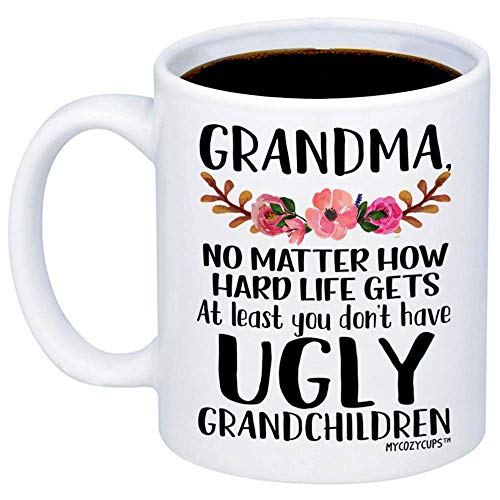 Product Cover MyCozyCups Gift For Grandma - At Least You Don't Have Ugly Grandchildren Coffee Mug - Funny 11oz Cup For Grandmothers, Mimi, Nana From Granddaughter, Grandson - Mother's Day, Birthday, Christmas Gift